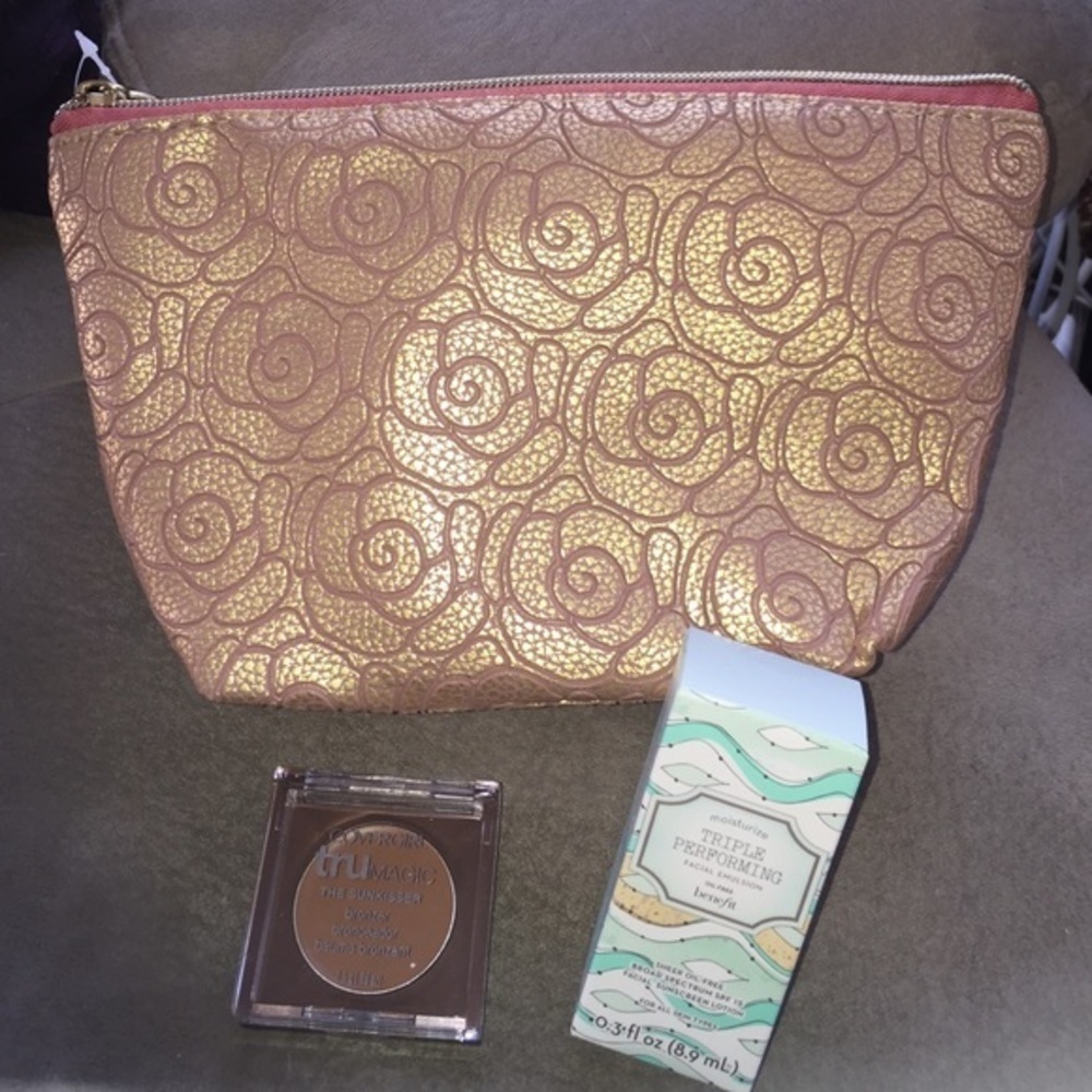 Makeup bag, sunscreen and Cover Girl bronzer